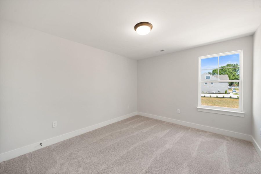 Spacious, unfurnished interior of a new home in Hayes Village, Greensboro (Image 19).