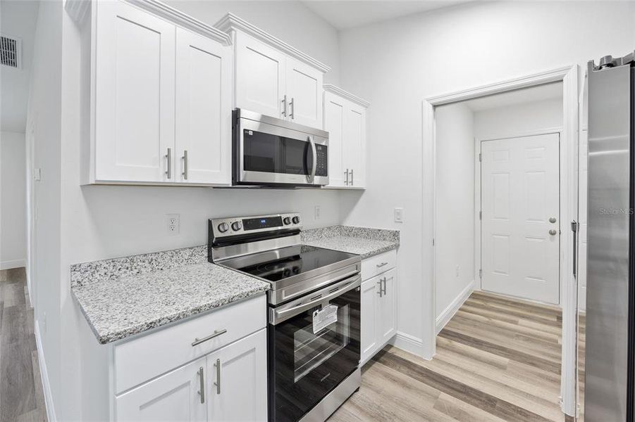 Furnished interior view inside a new home in , Summerfield (Image 7).