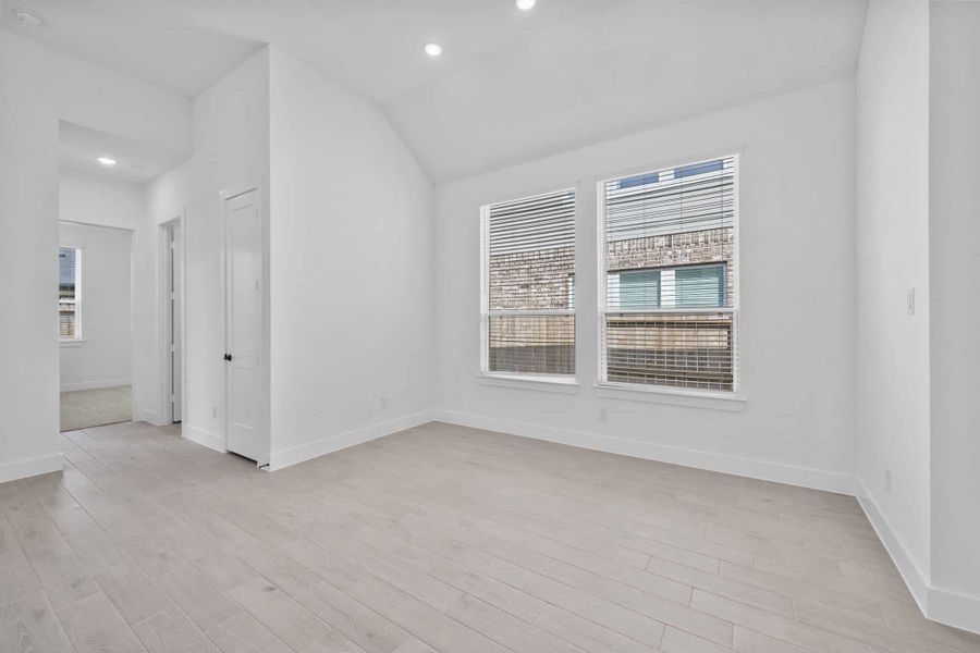 Representative unfurnished interior of a home built from the Summerton by Chesmar Homes in Grange, Katy (Image 14).