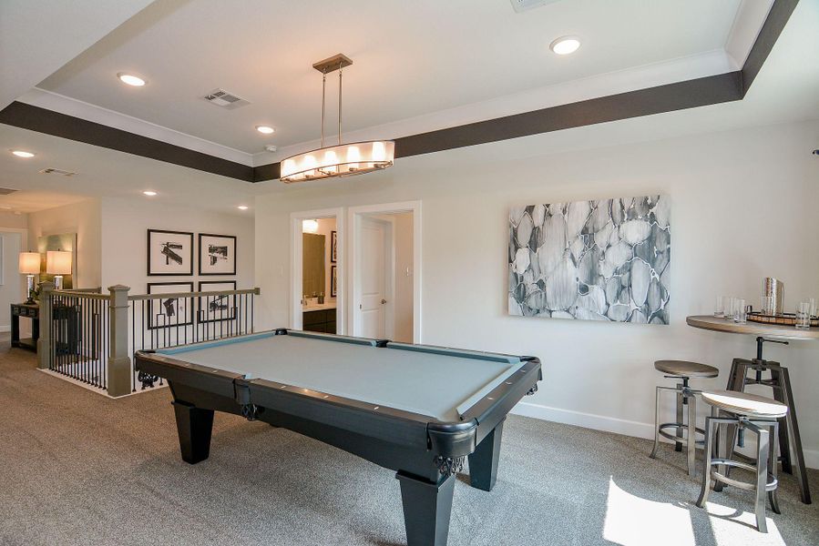 Furnished interior view inside a new home in Bridgeland, Cypress (Image 24).