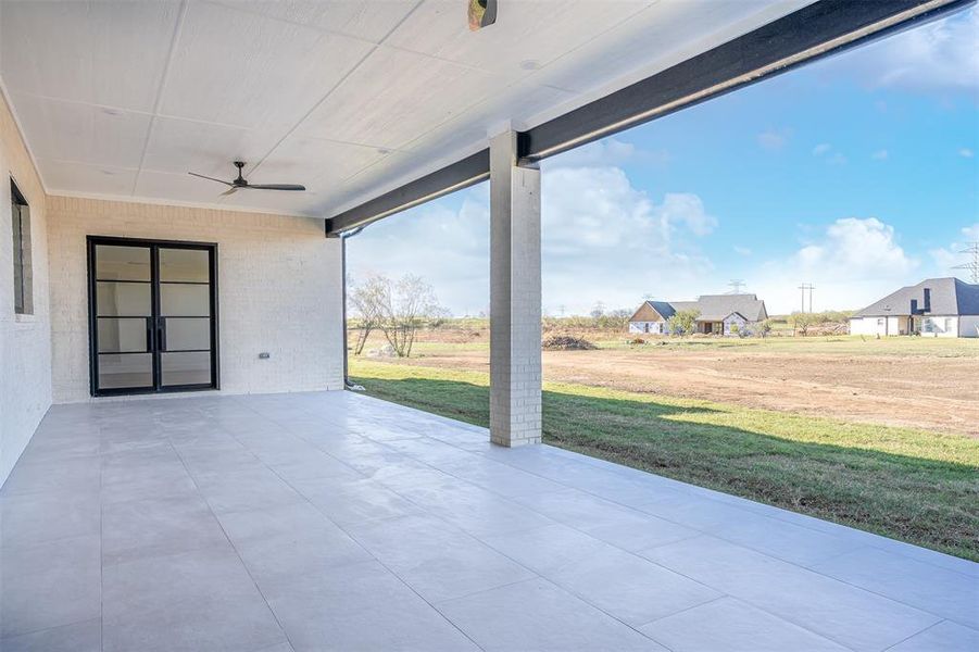 View of patio / terrace featuring ceiling fan