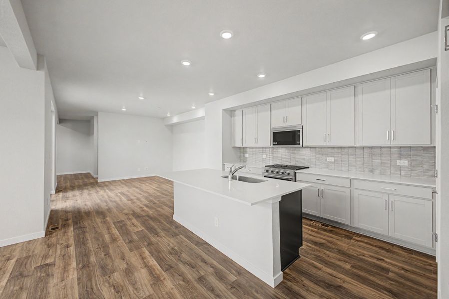 Furnished interior view inside a new home in Painted Prairie, Aurora (Image 9).