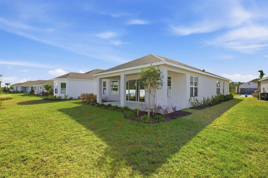 Exterior details and patio area of a home in Esplanade at Westview, Kissimmee (Image 20).