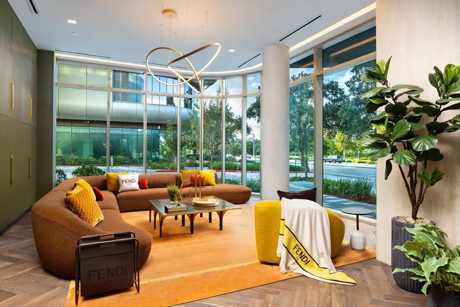 Step into the realm of opulence in the private luxury condo lobby adorned with exquisite FENDI Casa furniture. This grand entrance captivates with its sophisticated design, where every detail exudes luxury. From the elegant seating to the lavish finishes, immerse yourself in a world of refined elegance from the moment you arrive.