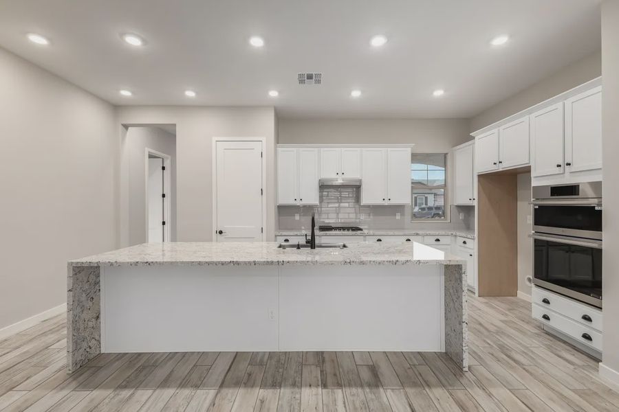 Furnished interior view inside a new home in Valencia at Granite Vista, Waddell (Image 7).