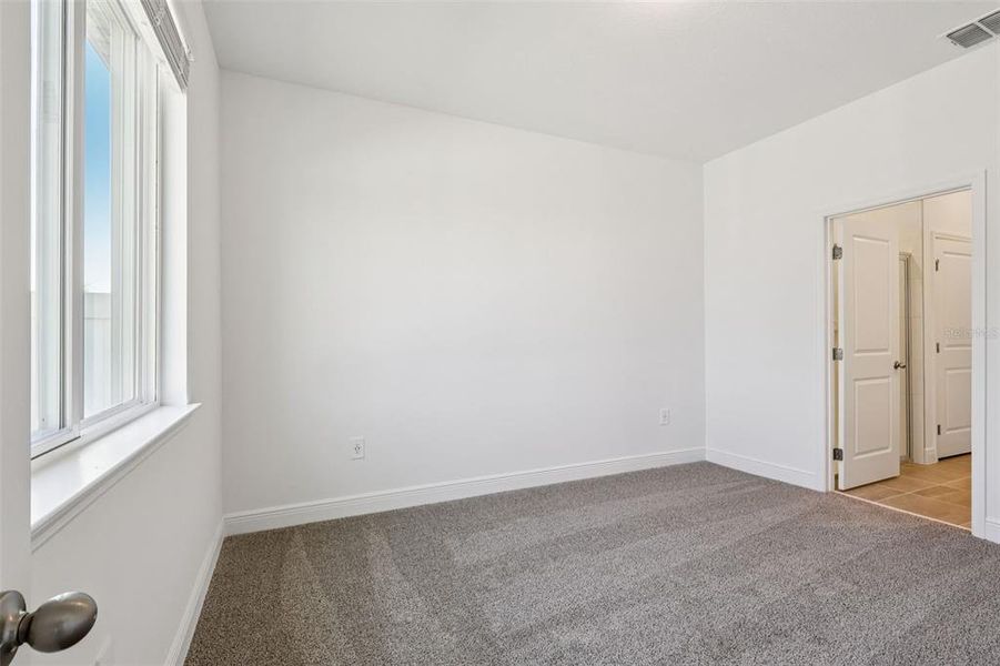 Spacious, unfurnished interior of a new home in Cyrene at Minneola - Villas, Minneola (Image 18).