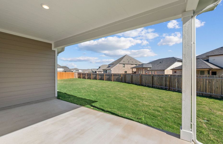 Exterior details and patio area of a home in Santa Rita Ranch, Liberty Hill (Image 27).