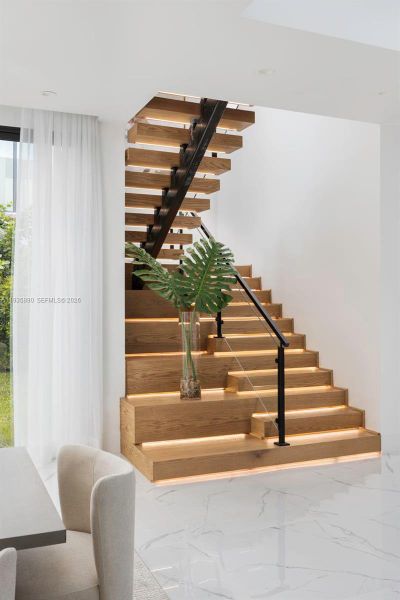 Furnished interior view inside a new home in , South Miami (Image 50).