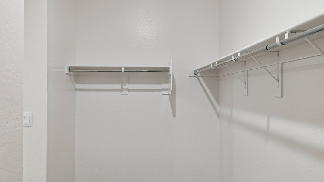 Representative unfurnished interior of a home built from the Hayden by D.R. Horton in The Ridge at Stone Butte, Phoenix (Image 37).
