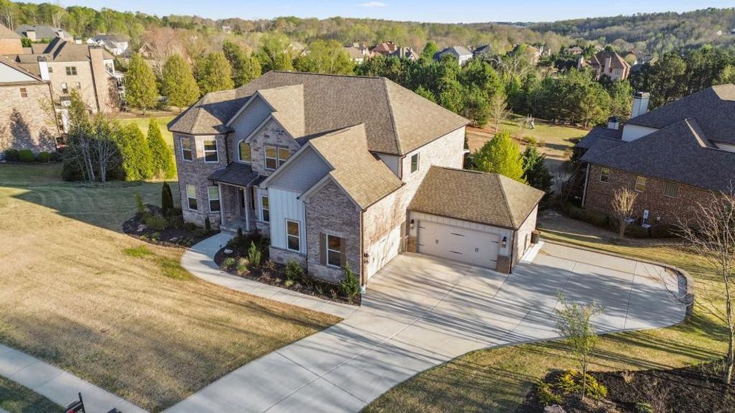 Front exterior of a new home in , Flowery Branch, GA, highlighting curb appeal (Image 29).