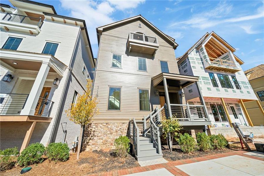 Front exterior of a new home in , Alpharetta, GA, highlighting curb appeal (Image 29).