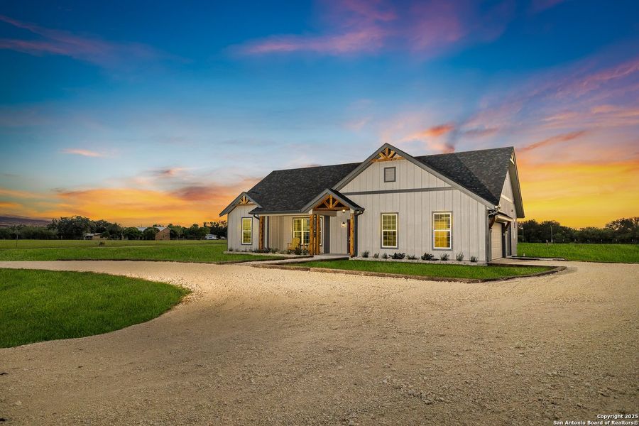 Front exterior of a new home in , Hondo, TX, highlighting curb appeal (Image 30). Front exterior of a new home in , Hondo, TX, highlighting curb appeal (Image 30).