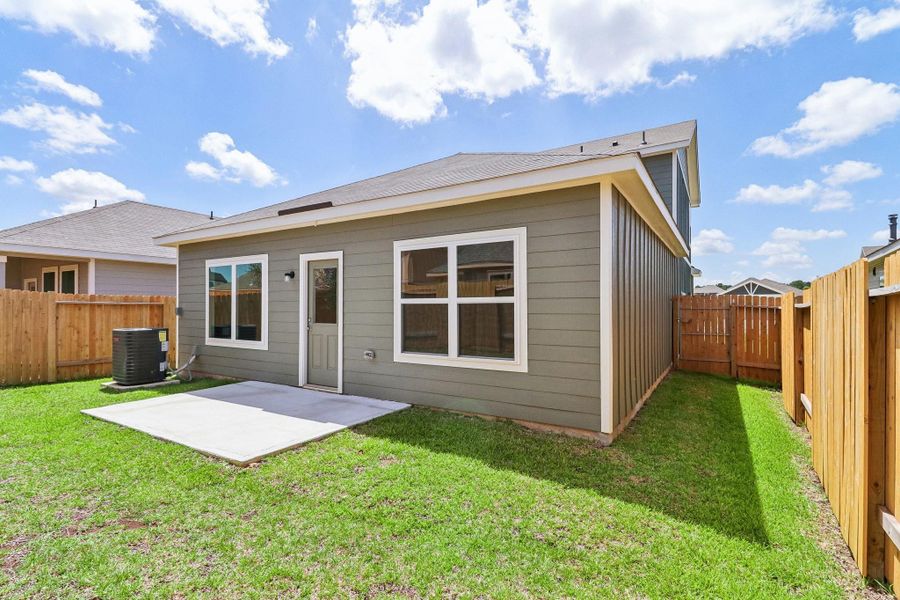 Exterior details and patio area of a home in Magnolia Woods, Magnolia (Image 4).