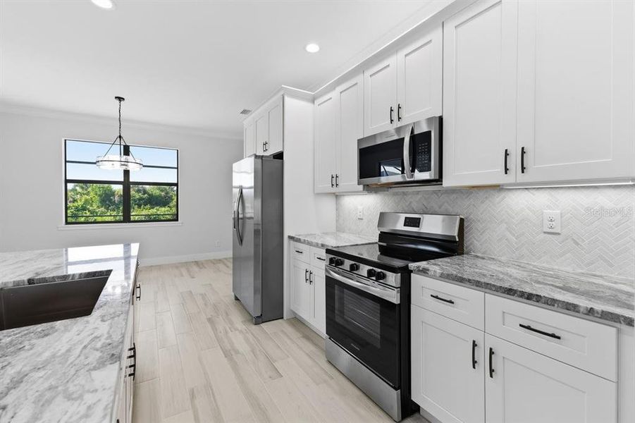 Furnished interior view inside a new home in , Englewood (Image 10).