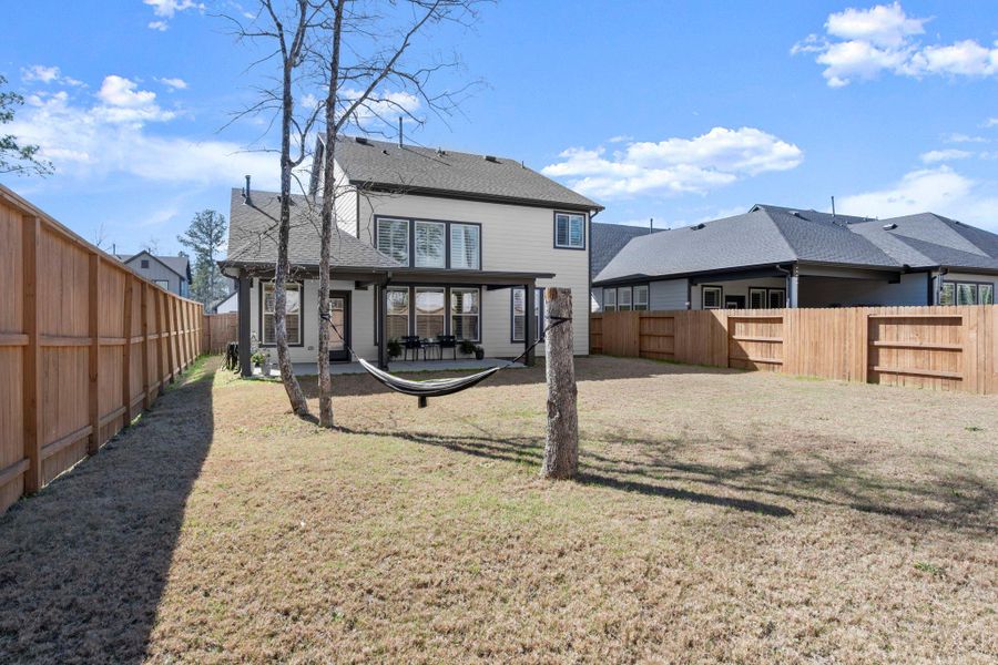 This large backyard offers the flexibility to create your own outdoor retreat. This large backyard offers the flexibility to create your own outdoor retreat.