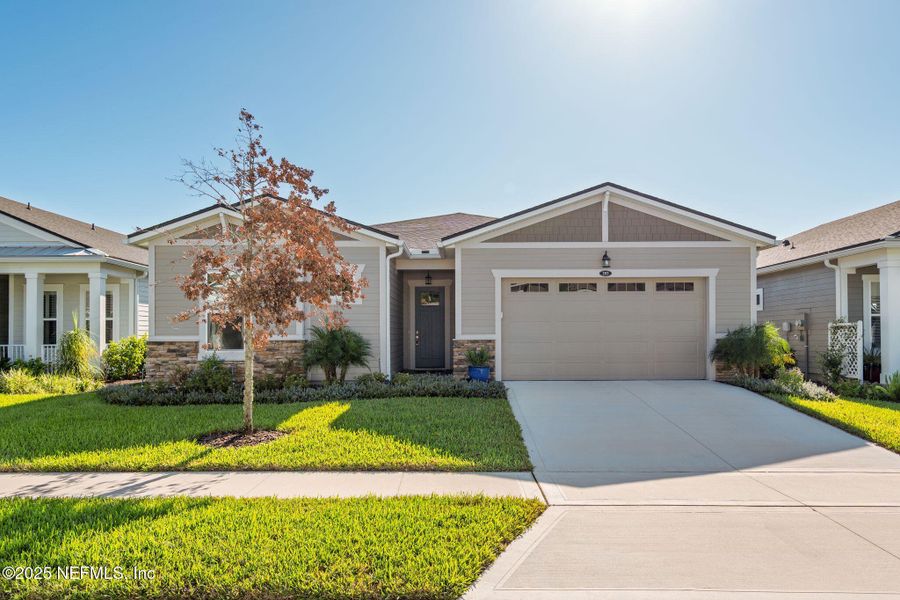 Front exterior of a new home in , St. Johns, FL, highlighting curb appeal (Image 2). Front exterior of a new home in , St. Johns, FL, highlighting curb appeal (Image 2).