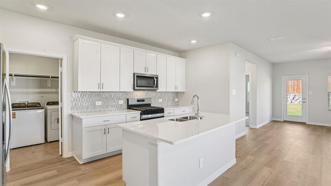 Furnished interior view inside a new home in Eastridge - Spring Series, McKinney (Image 7). Furnished interior view inside a new home in Eastridge - Spring Series, McKinney (Image 7).