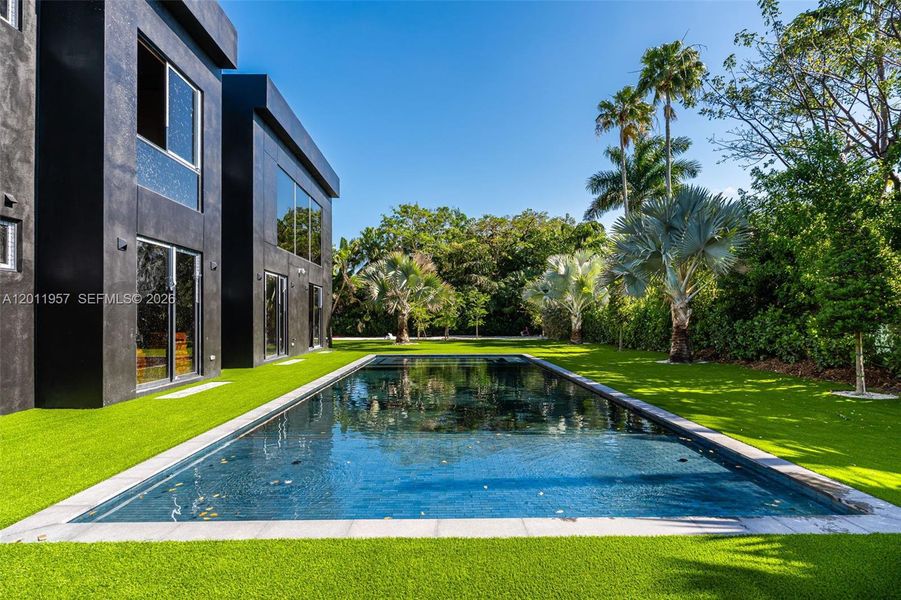Exterior details and patio area of a home in , Pinecrest (Image 10). Exterior details and patio area of a home in , Pinecrest (Image 10).