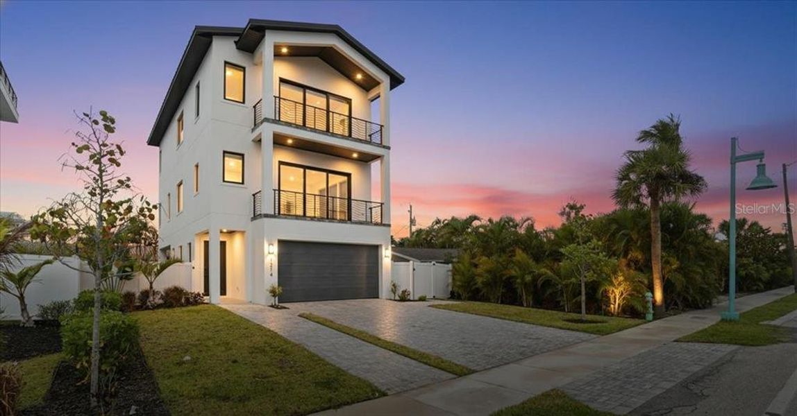 Front exterior of a new home in , Englewood, FL, highlighting curb appeal (Image 26).