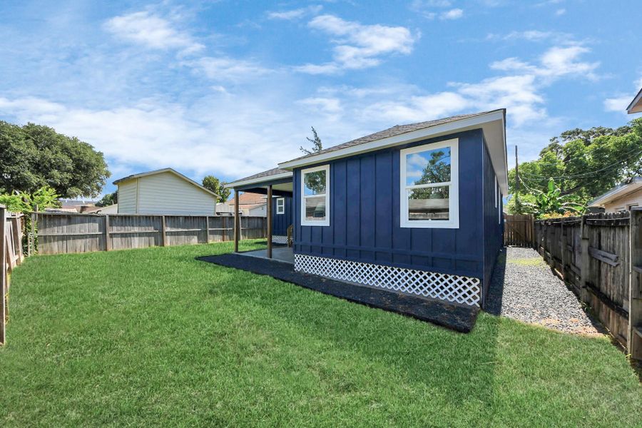 This spacious backyard is a blank canvas for outdoor living—add a dining set, string lights, garden beds, or even a fire pit to make it your own. The fully fenced layout is perfect for dogs to run and play freely, while still offering plenty of room for entertaining, relaxing, or creating your dream outdoor escape.