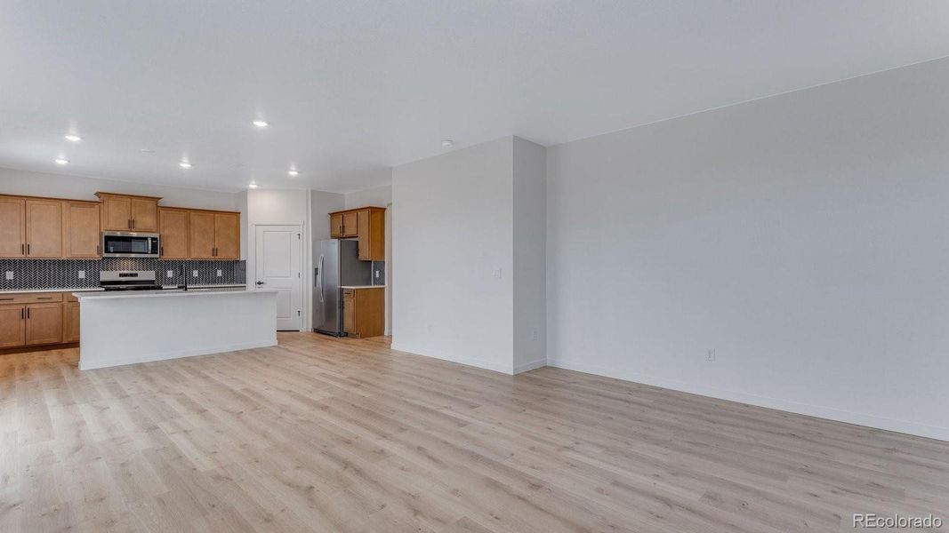 Spacious, unfurnished interior of a new home in Trails at Crowfoot, Parker (Image 28).