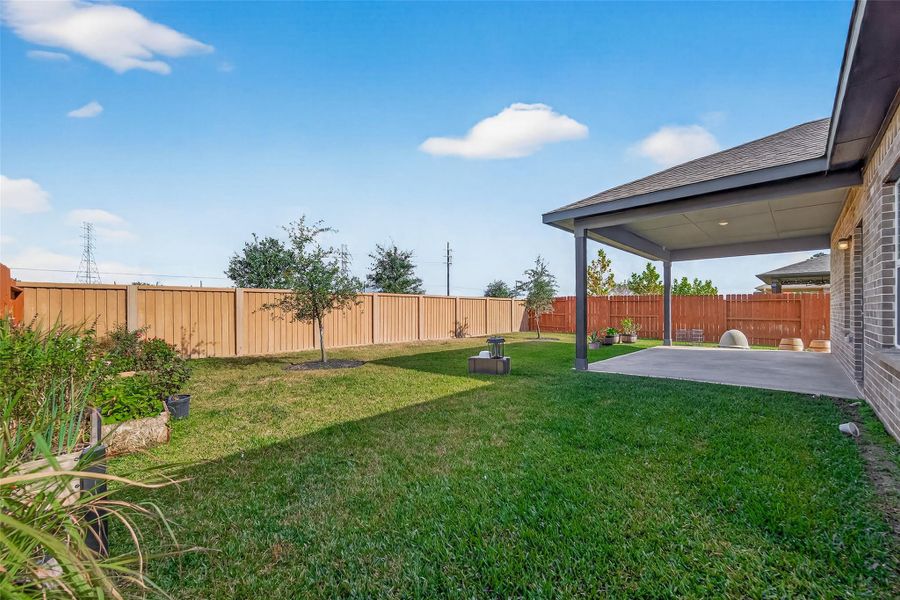 Exterior details and patio area of a home in Massey Oaks, Pearland (Image 27).