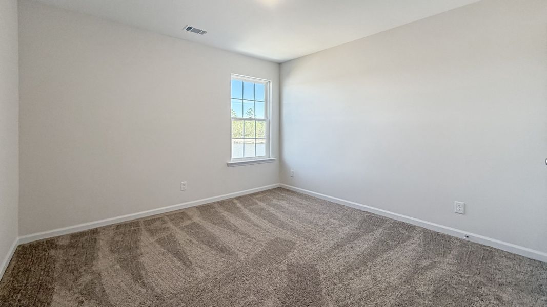 Spacious, unfurnished interior of a new home in Grand Reserve, Hinesville (Image 21).