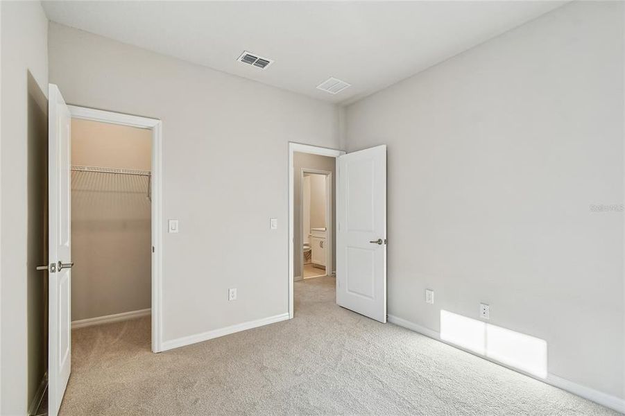 Spacious, unfurnished interior of a new home in Laureate Park at Lake Nona - Garden Series, Orlando (Image 36).
