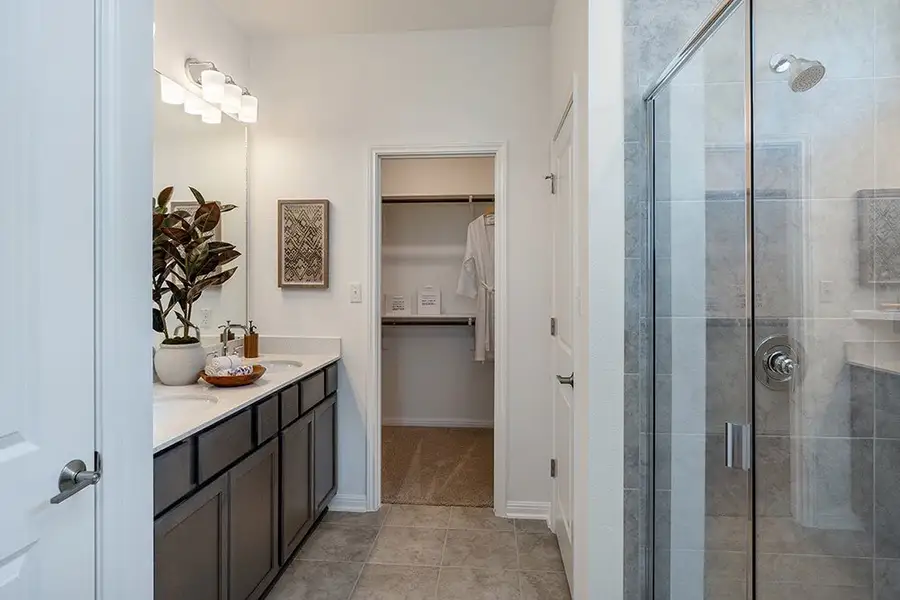 Representative furnished interior of a home built from the Jasmine by Taylor Morrison in Turner's Crossing 45s, Buda (Image 5).
