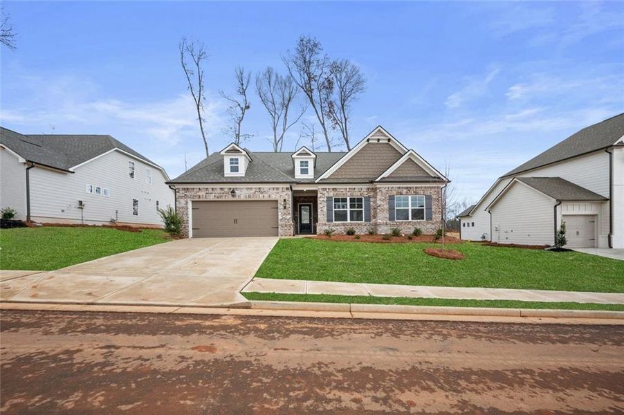 Front exterior of a new home in Summerlin, Winder, GA, highlighting curb appeal (Image 2). Front exterior of a new home in Summerlin, Winder, GA, highlighting curb appeal (Image 2).