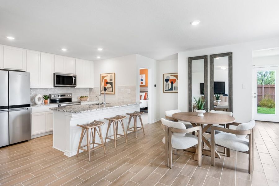 Representative furnished interior of a home built from the 1416 Modeled by KB Home in Spanish Trails, San Antonio (Image 8).