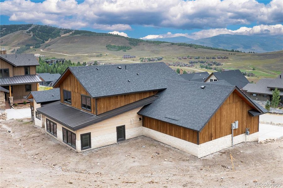 Front exterior of a new home in , Granby, CO, highlighting curb appeal (Image 26).