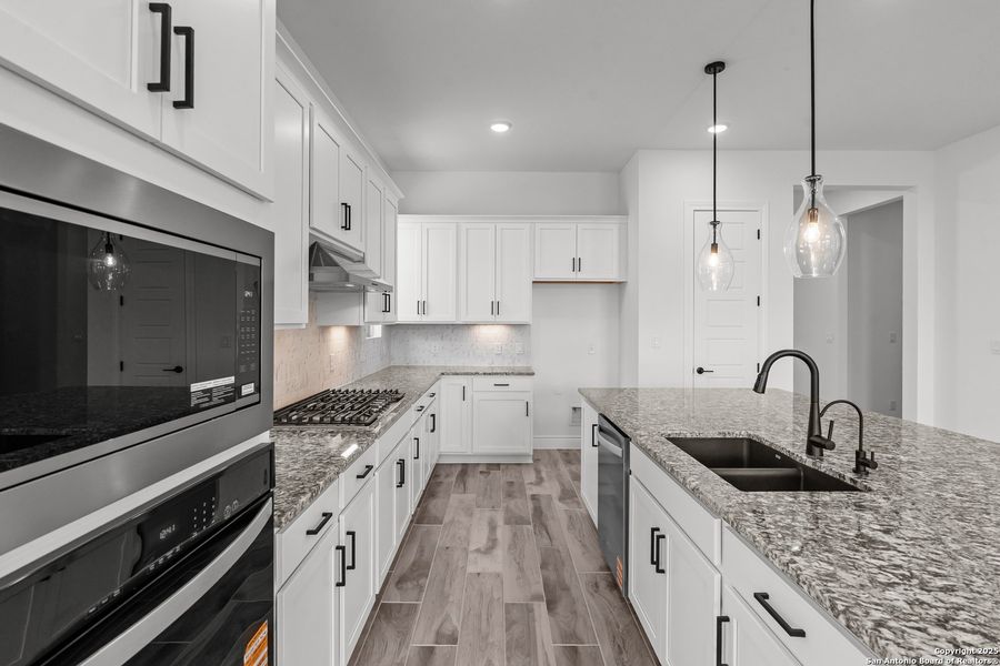 Furnished interior view inside a new home in Bison Ridge, San Antonio (Image 13).