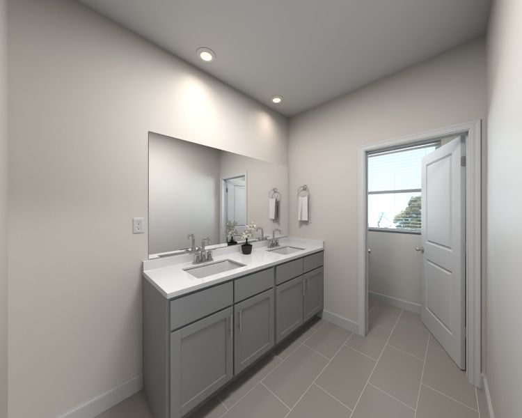 The primary suite boasts a private ensuite with dual sinks and a walk-in closet.