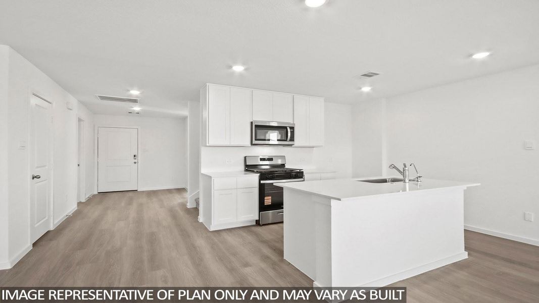 Furnished interior view inside a new home in Sunterra, Katy (Image 3).