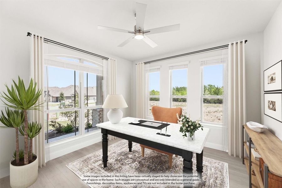 Home office with large windows, ceiling fan, hardwood floors, and a desk with marble top