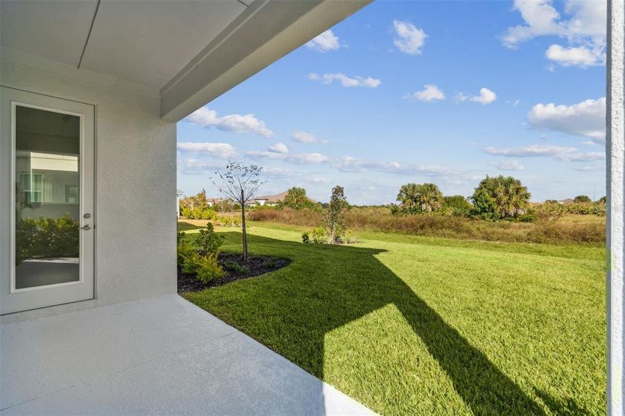 Exterior details and patio area of a home in Vistera of Venice – Garden Series, Nokomis (Image 3).