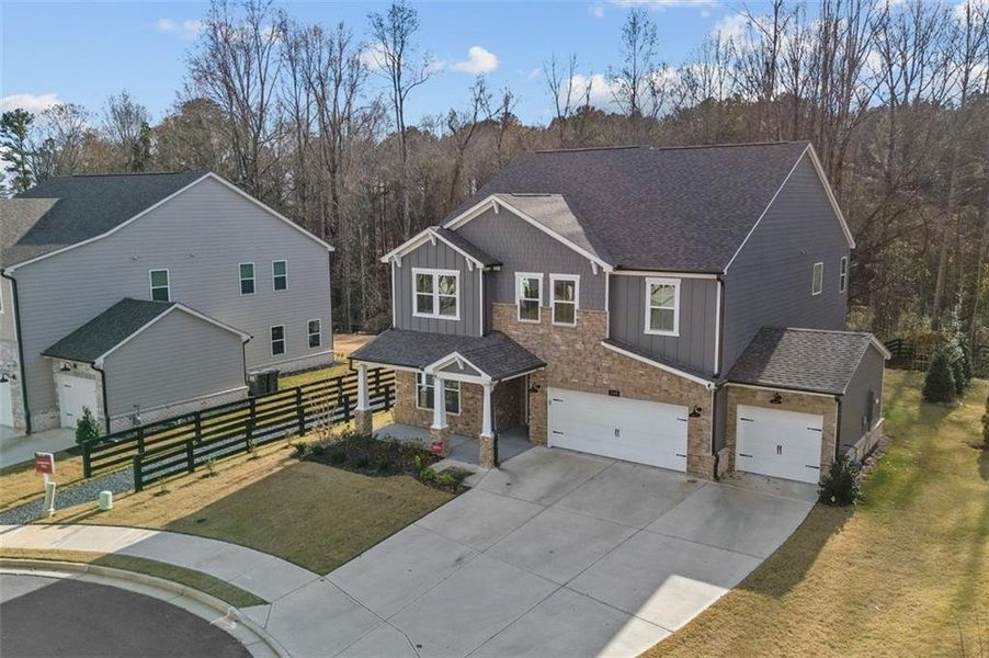 Front exterior of a new home in Hillside Manor, Powder Springs, GA, highlighting curb appeal (Image 2).