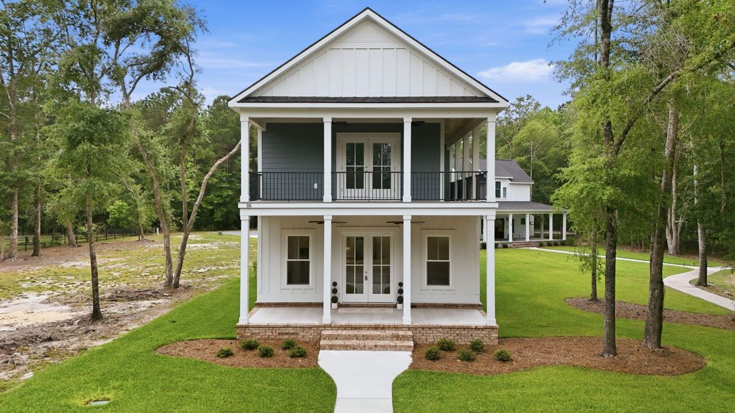 Front exterior of a new home in , Georgetown, SC, highlighting curb appeal (Image 1). Front exterior of a new home in , Georgetown, SC, highlighting curb appeal (Image 1).