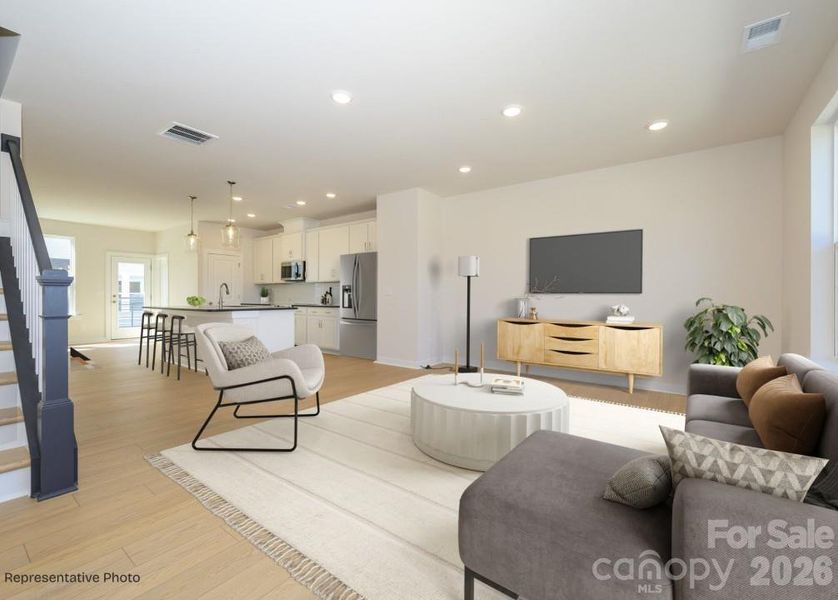 Furnished interior view inside a new home in Central Living at Craig, Charlotte (Image 3).