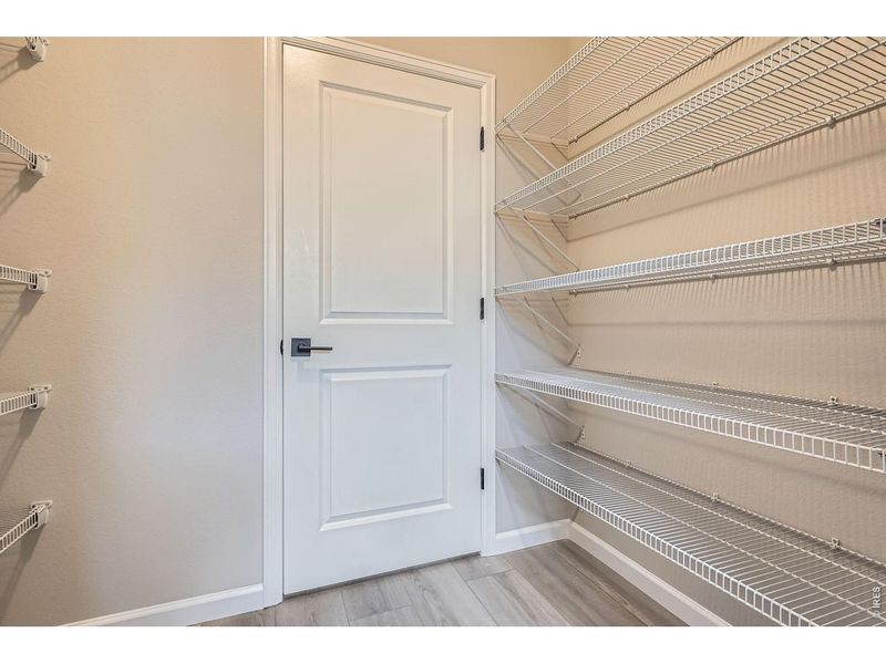 Spacious, unfurnished interior of a new home in Farmstead, Berthoud (Image 32).