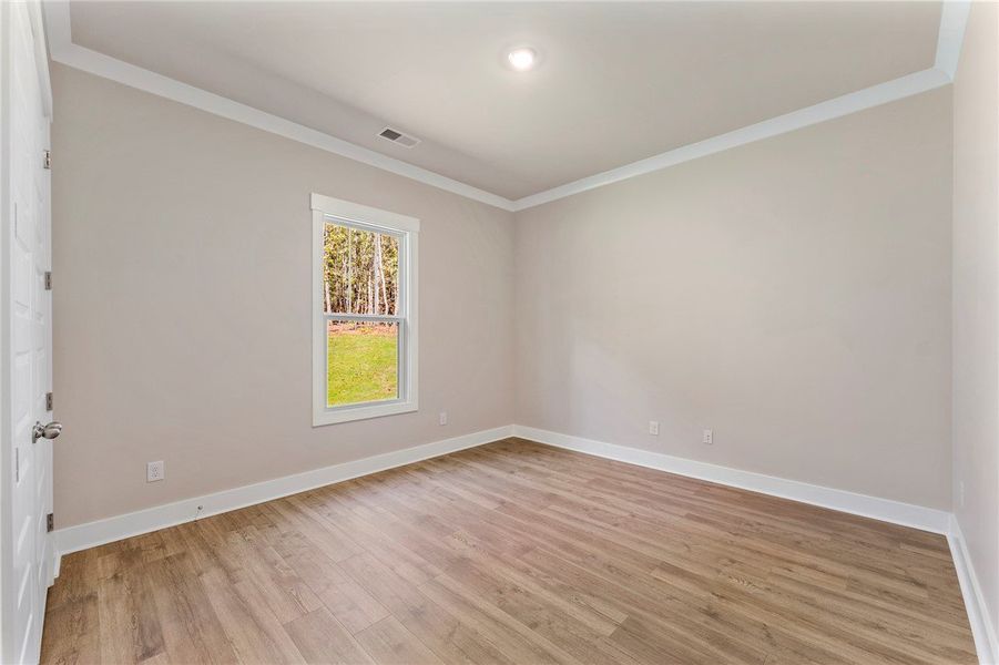 Bedroom 2 -Images are of a different home with a s