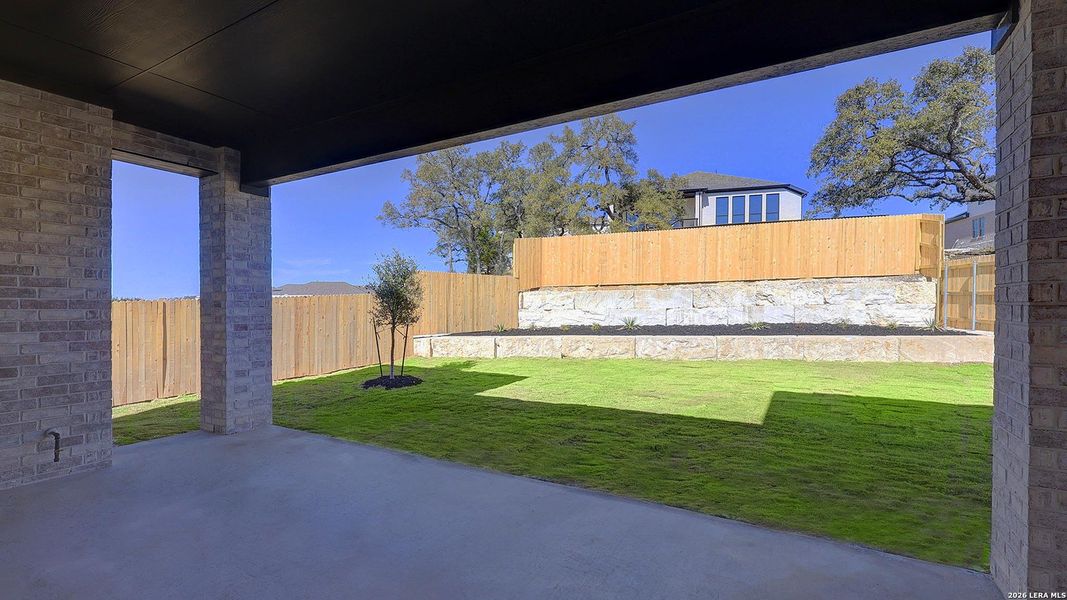 Exterior details and patio area of a home in The Ranches at Creekside, Boerne (Image 3).