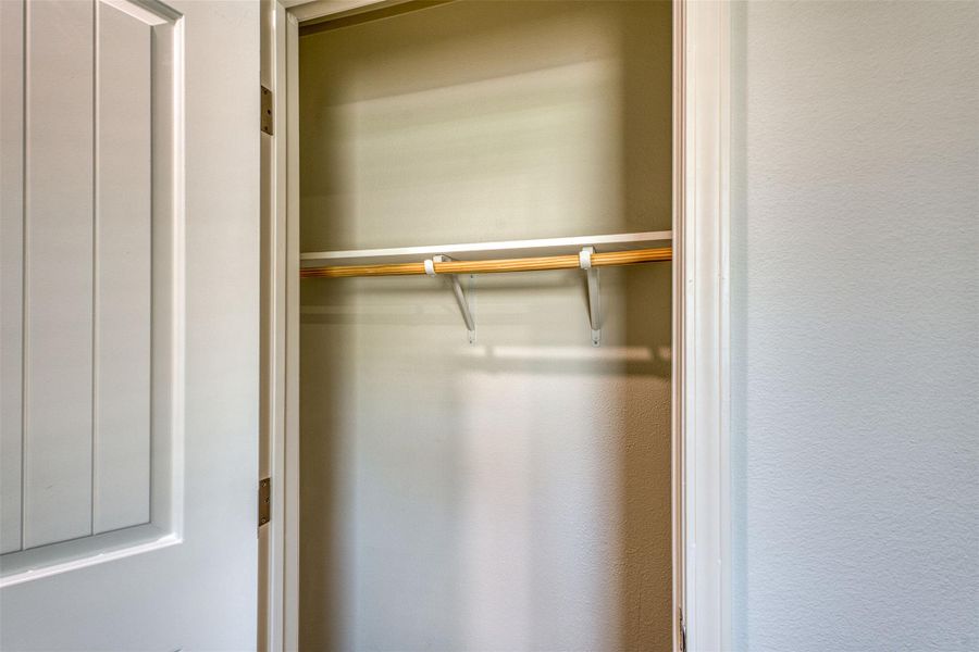 An organized closet, ready for personalized storage solutions, maximizes the home's functional space. An organized closet, ready for personalized storage solutions, maximizes the home's functional space.