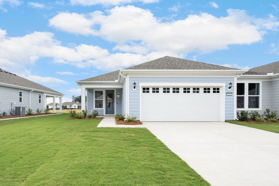 Front exterior of a new home in Sun City Hilton Head, Bluffton, SC, highlighting curb appeal (Image 19).