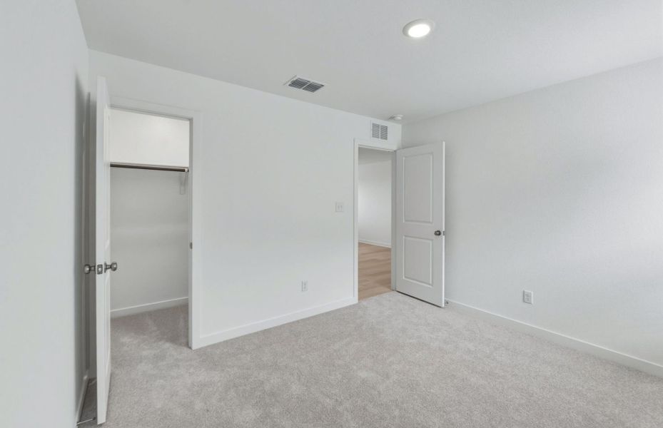 Spacious, unfurnished interior of a new home in Sunfield, Buda (Image 14). Spacious, unfurnished interior of a new home in Sunfield, Buda (Image 14).