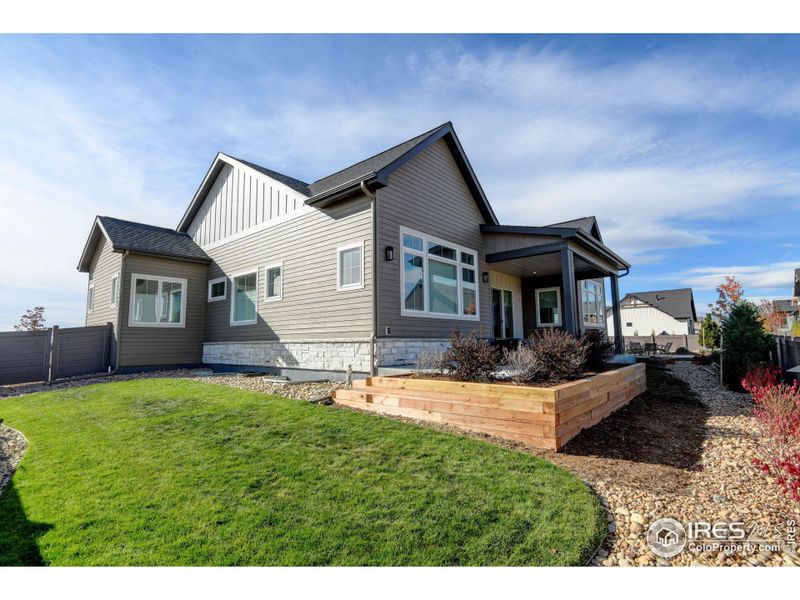 side yard offers grass for throwing the football or pets to run and play side yard offers grass for throwing the football or pets to run and play