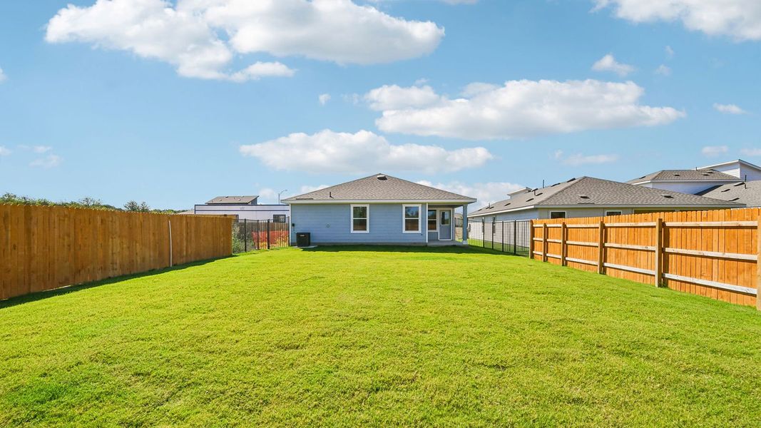 Exterior details and patio area of a home in Trails at Wildhorse, Austin (Image 21).