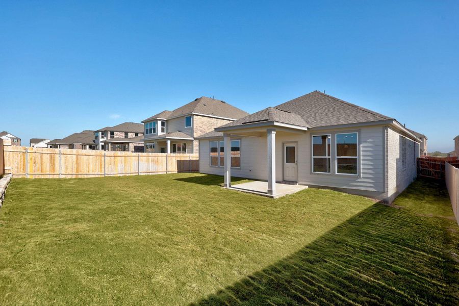 Exterior details and patio area of a home in Salerno - Classic Collection, Round Rock (Image 19). Exterior details and patio area of a home in Salerno - Classic Collection, Round Rock (Image 19).