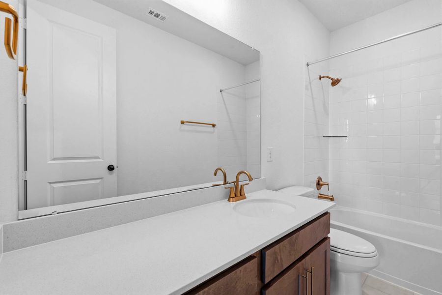 Furnished interior view inside a new home in Sunterra Lakes, Brookshire (Image 12).